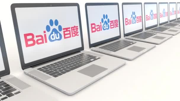 Сучасні лаптопи з логотипом Baidu. Комп'ютерні технології концептуальні редакційної 4 к кліп, безшовні петлю — стокове відео