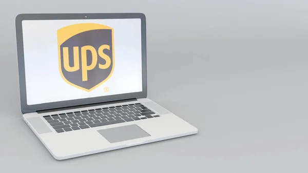 Portatile con logo United Parcel Service UPS. Tecnologia informatica concettuale editoriale rendering 3D — Foto Stock