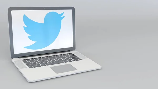 Computadora portátil con el logotipo de Twitter, Inc.. Tecnología informática editorial conceptual 3D rendering — Foto de Stock