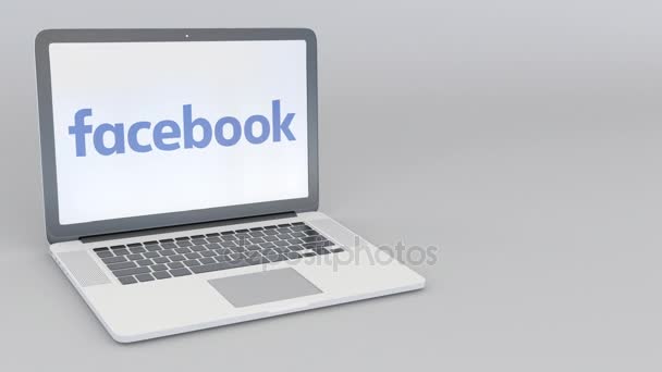 Περιστρεφόμενο άνοιγμα και το κλείσιμο του φορητού υπολογιστή με το λογότυπο του Facebook. Υπολογιστή τεχνολογία εννοιολογική συντακτική 4k κλιπ — Αρχείο Βίντεο