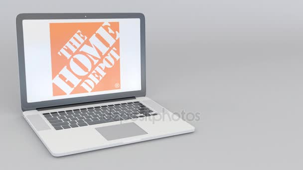 Portátil giratorio de apertura y cierre con el logotipo de Home Depot. Tecnología informática editorial conceptual 4K clip — Vídeos de Stock