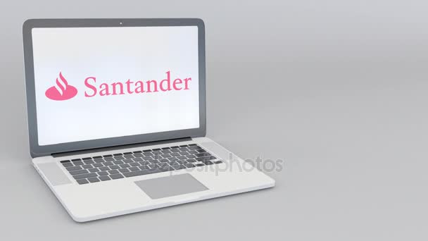 旋转开启和关闭笔记本电脑与西班牙桑坦德银行 Serfin 标志。计算机技术概念编辑 4 k 剪辑 — 图库视频影像