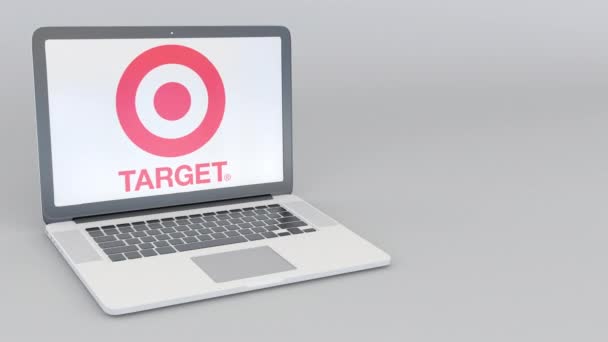 Rotating opening and closing laptop with Target Corporation logo. Computer technology conceptual editorial 4K clip — Stock Video