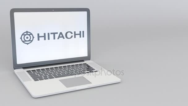 Forgó nyitó és záró laptop Hitachi logóval. Számítógép technológia fogalmi szerkesztői 4k klip — Stock videók