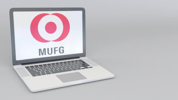 Mufg のロゴとノート パソコンの開閉を回転します。コンピューター技術概念の編集 4 k クリップ — ストック動画