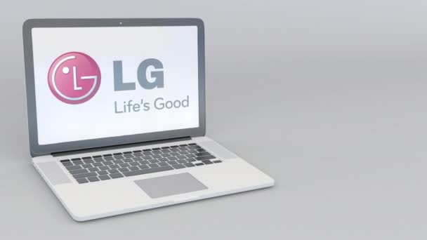 Rotating opening and closing laptop with LG Corporation logo. Computer technology conceptual editorial 4K clip — Stock Video