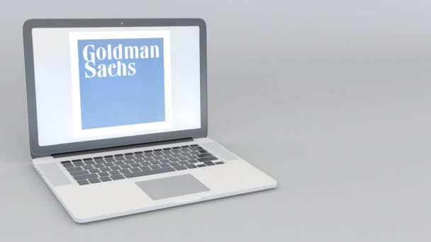 Roterende openen en sluiten van laptop met het logo van Goldman Sachs Group, Inc. Computer technologie conceptuele redactionele 4k clip — Stockvideo