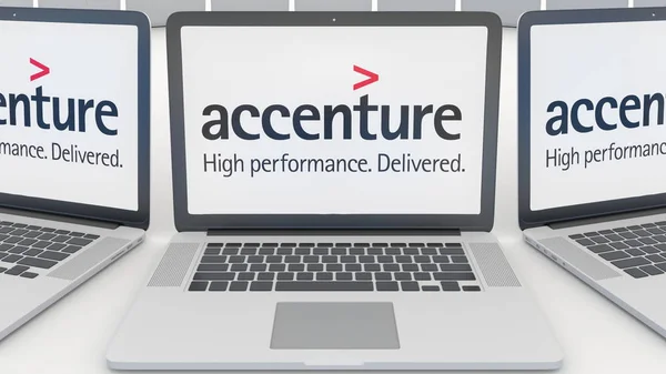 Laptopuri cu logo-ul Accenture pe ecran. Tehnologia computerului redarea 3D editorială conceptuală — Fotografie, imagine de stoc