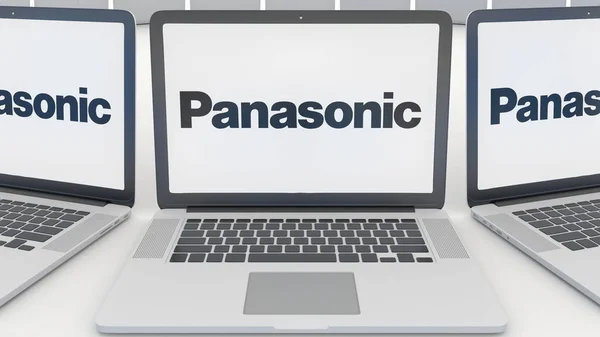 画面上のパナソニック株式会社のロゴとノート パソコン。コンピューター技術概念編集 3 d レンダリング — ストック写真