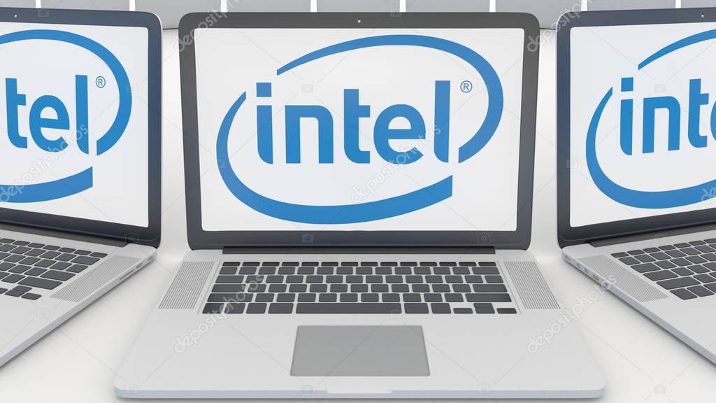 Laptops with Intel Corporation logo on the screen. Computer technology conceptual editorial 3D