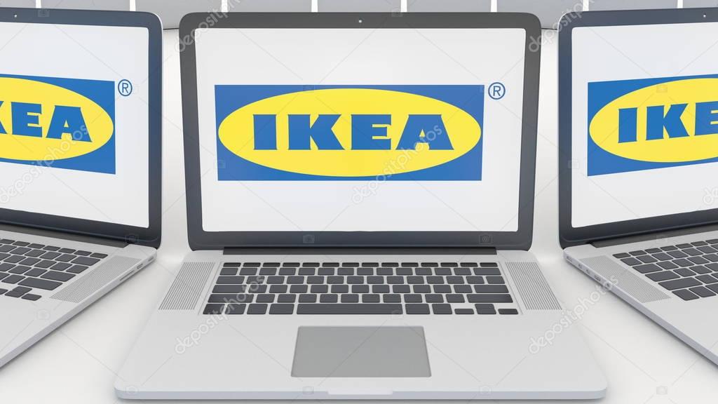 Laptops with Ikea logo on the screen. Computer technology conceptual editorial 3D