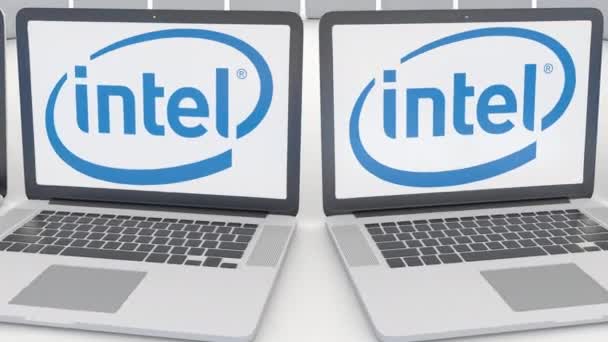 Сумки для ноутбуків корпорації Intel логотип на екрані. Комп'ютерні технології концептуальні редакційної 4 к кліп, безшовні петлю — стокове відео