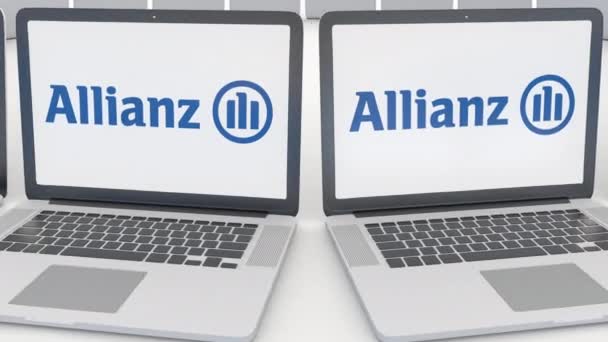 Portatili con logo Allianz sullo schermo. Tecnologia informatica concettuale editoriale clip 4K, loop senza soluzione di continuità — Video Stock