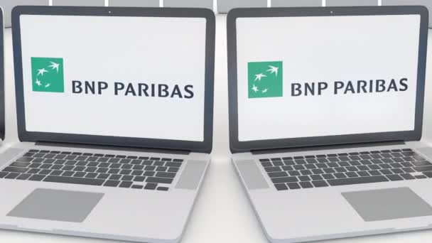 노트북 화면에 Bnp Paribas 로고와 함께입니다. 컴퓨터 기술 개념 편집 4 k 클립, 원활한 루프 — 비디오