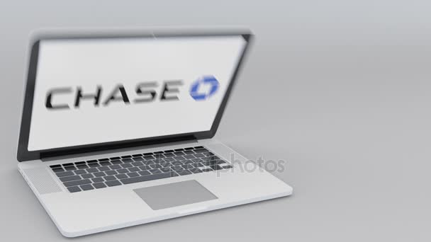 Açılış ve kapanış Jpmorgan Chase Bank logo üstünde belgili tanımlık perde ile dizüstü bilgisayar. Bilgisayar teknolojisi kavramsal editoryal 4k klip — Stok video