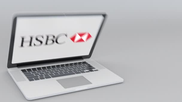 열고 닫는 노트북 화면에 Hsbc 로고와 함께 컴퓨터 기술 개념 편집 4 k 클립 — 비디오