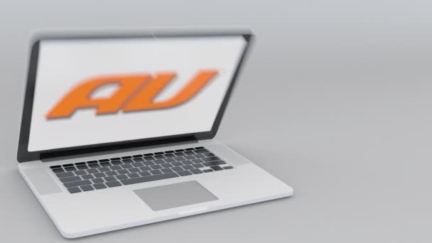 Открытие и закрытие ноутбука с логотипом компании Au Mobile на экране. Концептуальная редакционная статья по компьютерным технологиям — стоковое видео