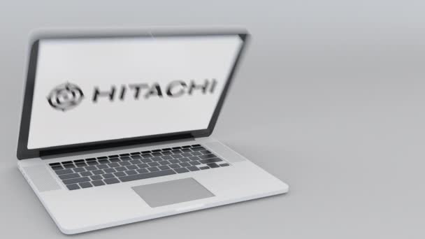 Nyitó és záró laptop-val Hitachi logó a képernyőn. Számítógép technológia fogalmi szerkesztői 4k klip — Stock videók