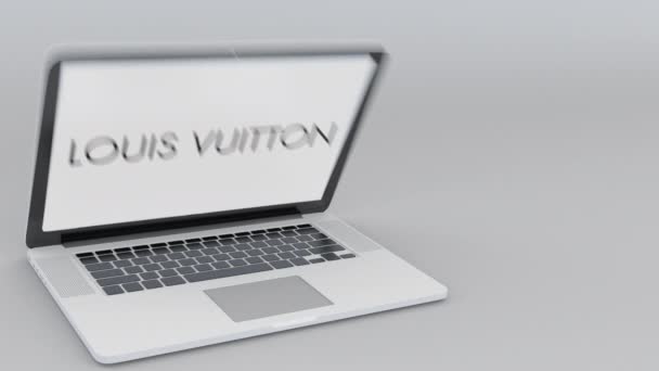 Membuka dan menutup laptop dengan logo Louis Vuitton di layar. Komputer teknologi konseptual editorial 4K klip — Stok Video