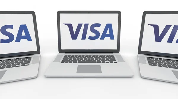 Ноутбуки с логотипом Visa Inc. на экране. Концептуальная редакционная 3D рендеринг компьютерных технологий — стоковое фото