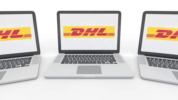 Notizbücher mit dhl express-Logo auf dem Bildschirm. Computertechnologie konzeptionelles redaktionelles 3D-Rendering — Stockfoto