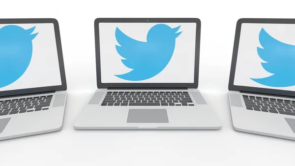 Cuadernos con el logotipo de Twitter, Inc. en la pantalla. Tecnología informática editorial conceptual 3D rendering — Foto de Stock