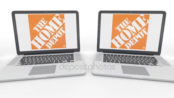 Notebooks com o logotipo do Home Depot na tela. Tecnologia de computador editorial conceitual clipe 4K, loop sem costura — Vídeo de Stock