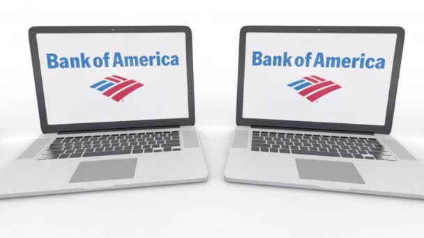 Carnets avec logo Bank of America à l'écran. Technologie informatique conceptuel éditorial clip 4K, boucle transparente — Video