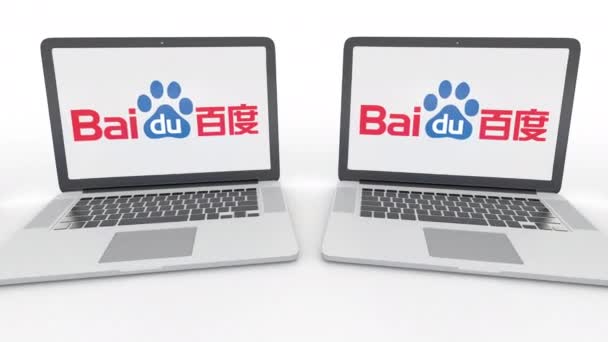 Notizbücher mit baidu-Logo auf dem Bildschirm. Computertechnologie konzeptioneller redaktioneller 4k-Clip, nahtlose Schleife — Stockvideo