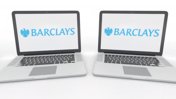 Notebooks com logotipo Barclays na tela. Tecnologia de computador editorial conceitual clipe 4K, loop sem costura — Vídeo de Stock