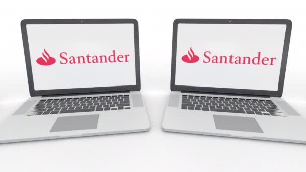 Блокноти Santander Serfin логотип на екрані. Комп'ютерні технології концептуальні редакційної 4 к кліп, безшовні петлю — стокове відео