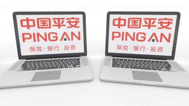 Quaderni con logo Ping An sullo schermo. Tecnologia informatica concettuale editoriale clip 4K, loop senza soluzione di continuità — Video Stock