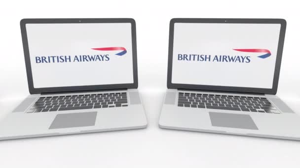 笔记本与英国航空公司徽标在屏幕上。电脑技术概念编辑 4 k 剪辑，无缝环 — 图库视频影像