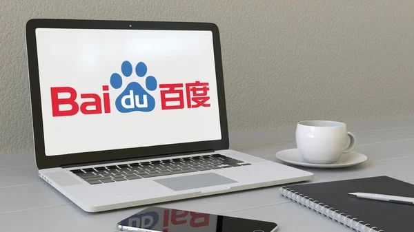 Portátil con logotipo Baidu en la pantalla. Moderno lugar de trabajo editorial conceptual 3D rendering —  Fotos de Stock