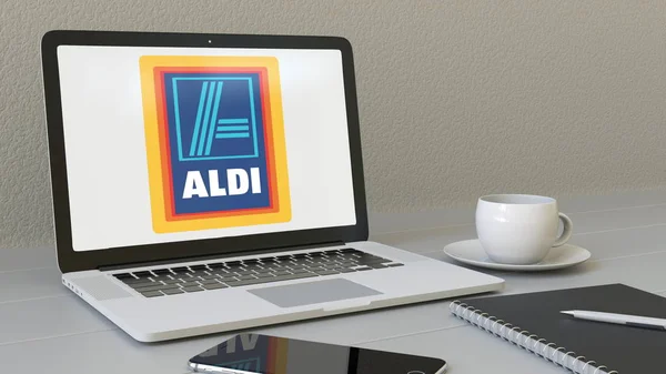 Laptop with Aldi logo on the screen. Modern workplace conceptual editorial 3D rendering — Stock Photo, Image