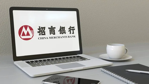 Portátil con el logotipo de China Merchants Bank en la pantalla. Moderno lugar de trabajo editorial conceptual 3D rendering —  Fotos de Stock