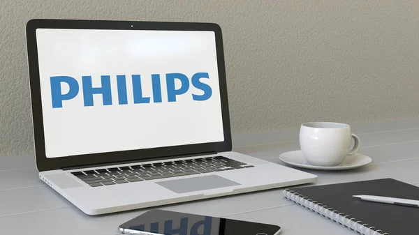 Laptop mit Philips-Logo auf dem Bildschirm. modernes arbeitsplatzkonzeptionelles Editorial 3D-Rendering — Stockfoto