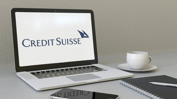 Credit Suisse csoport logó a képernyő a laptop. Modern munkahelyi fogalmi szerkesztői 3d-leképezés — Stock Fotó