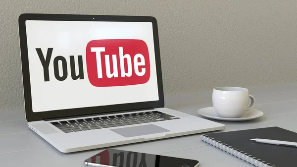 Laptop dengan logo YouTube di layar. Pencitraan 3D konseptual tempat kerja modern — Stok Foto