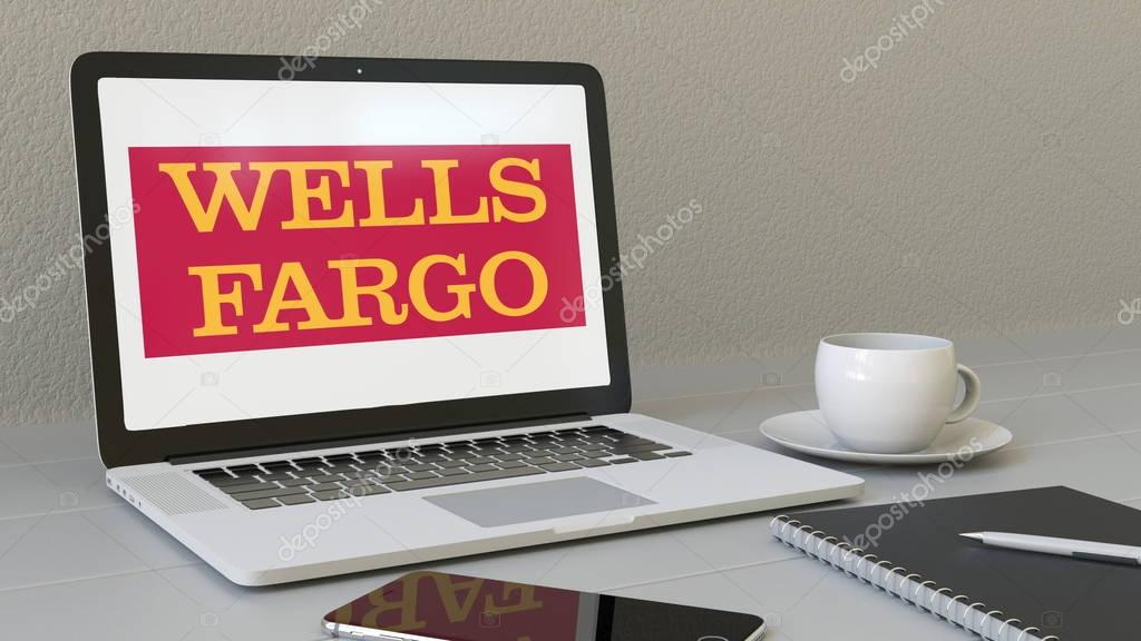 Laptop with Wells Fargo logo on the screen. Modern workplace conceptual editorial 4K animation