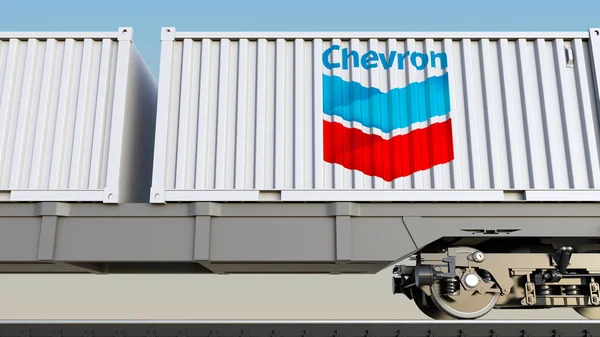 Eisenbahntransport von Containern mit dem Firmenlogo von Chevron. redaktionelles 3D-Rendering — Stockfoto