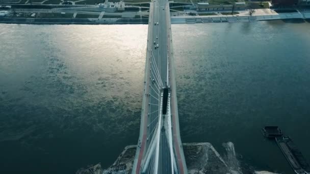 Aerial shot of Vistula river and Holy Cross cable bridge in Warsaw, Poland. 4K video — Stock Video