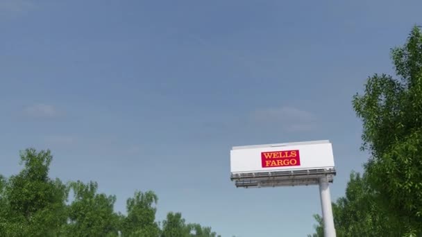 Doğru reklam billboard Wells Fargo logosu ile sürüş. Editoryal 3d 4 k klip oluşturma — Stok video