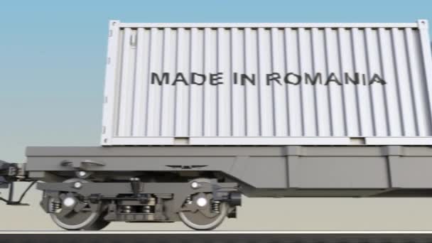 Train de marchandises et conteneurs en mouvement avec légende MADE IN ROMANIA. Transport ferroviaire. Boucle sans couture clip 4K — Video