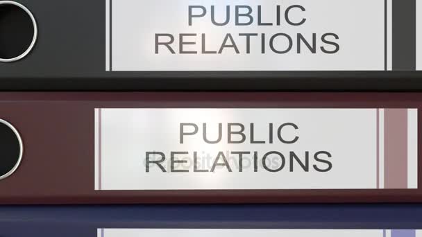 Empilhamento vertical de ligantes de escritório multicoloridos com etiquetas de relações públicas — Vídeo de Stock