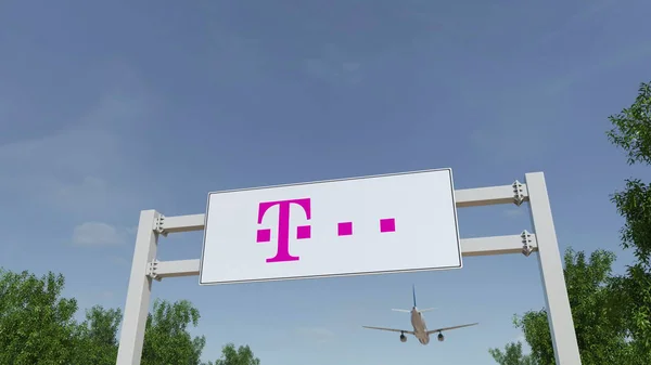 Vliegtuig vliegen over reclame bord met T-Mobile logo. Redactioneel 3D-rendering — Stockfoto