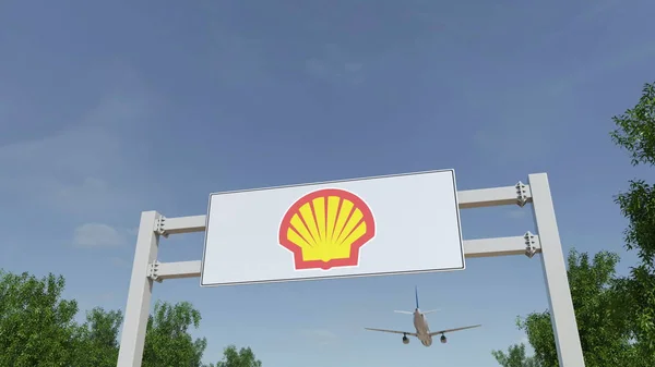 Avión volando sobre cartelera publicitaria con el logotipo de Shell Oil Company. Representación Editorial 3D — Foto de Stock