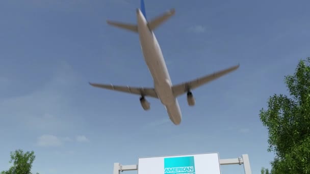 Flygplan som flyger över reklam skylt med American Express-logotypen. Redaktionella 3d rendering 4 k klipp — Stockvideo