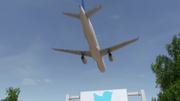 飛行機は、Twitter 社のロゴと看板を広告の上を飛んでします。編集 3 d 4 k クリップをレンダリング — ストック動画