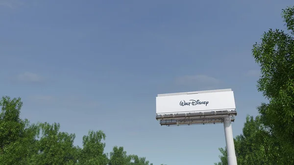 Движение к рекламному щиту с логотипом Walt Disney Pictures. Редакционная 3D рендеринг — стоковое фото